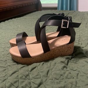 Women’s black sandals size 10 wide.